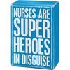 Box Sign & Sock Set - Nurses Are Super Heroes - Box Sign: 3" x 4.50" x 1.75", Socks: One Size Fits Most - Wood, Cotton, Nylon, Spandex, Ribbon